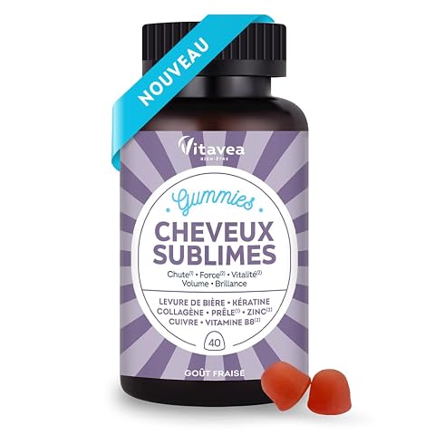 Gommes cheveux violettes au goût fraise disposées sur une pierre claire dans une salle de bain épurée.