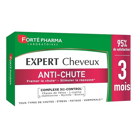 Quatre-vingt-dix comprimés verts rangés sur une pierre claire dans une salle de bain épurée.
