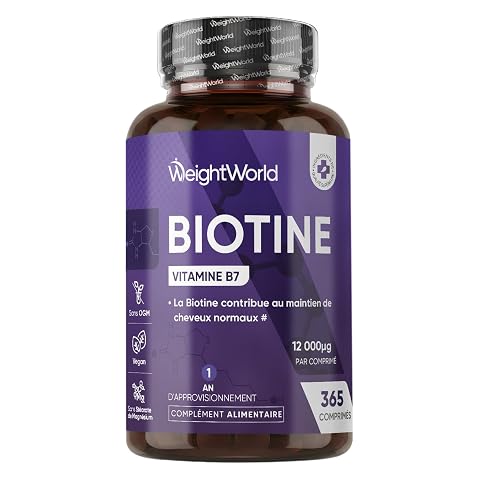 Flacon neutre de biotine et micro-comprimés disposés sur une pierre claire dans une salle de bain