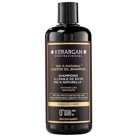 Flacon noir de shampoing à l’huile de ricin posé sur une pierre claire dans une salle de bain épurée