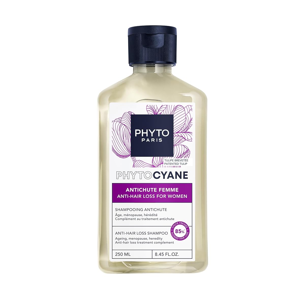 Flacon compact de shampooing Phyto Phytocyane Intensive+ posé sur une surface en pierre claire.