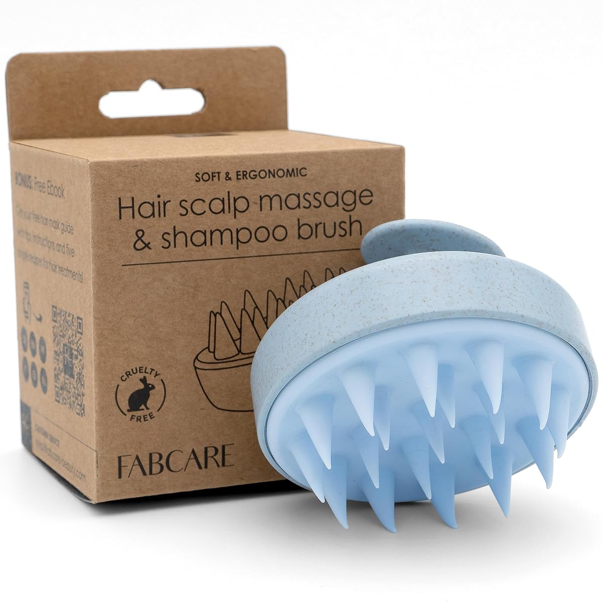 Brosse bleue Fabcare de massage du cuir chevelu posée sur une surface en pierre claire